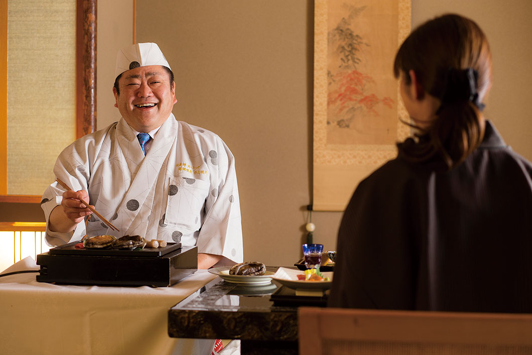 Photo: A chef prepares food right in front of you