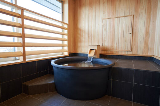 Photo: Indoor hot spring in a guest room at Tendo Hotel