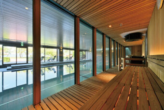 Image: A poolside sauna that overlooks the open-air bathing terrace where you can relax in the fresh lakeside air.