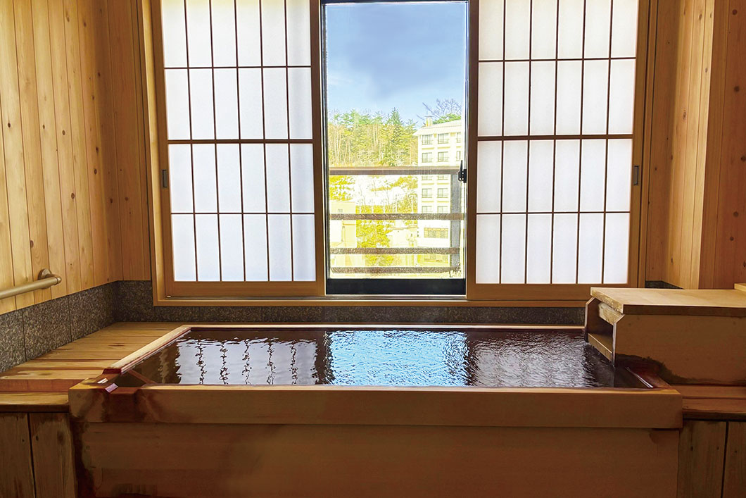 Photo: Japanese-Western style room with indoor hot spring bath