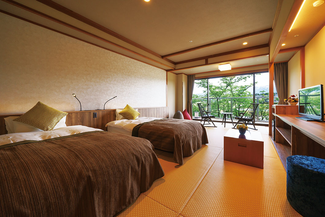 Photo: Kintarou Onsen Bettei "Mine no Kai" Japanese-style room with bed